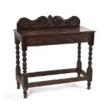 Property of a lady - a carved oak hall table, with reel turned supports, parts 18th century, 39.