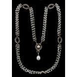 A fine early 20th century Belle Epoque pearl & diamond three strand necklace set with two large
