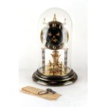 Property of a gentleman - a Kundo 400-day or anniversary clock, decorated with flowers on black