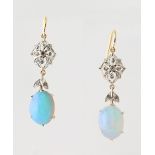 A pair of opal & diamond pendant earrings, each approximately 1.4ins. (3.6cms.) long, boxed (2) (see
