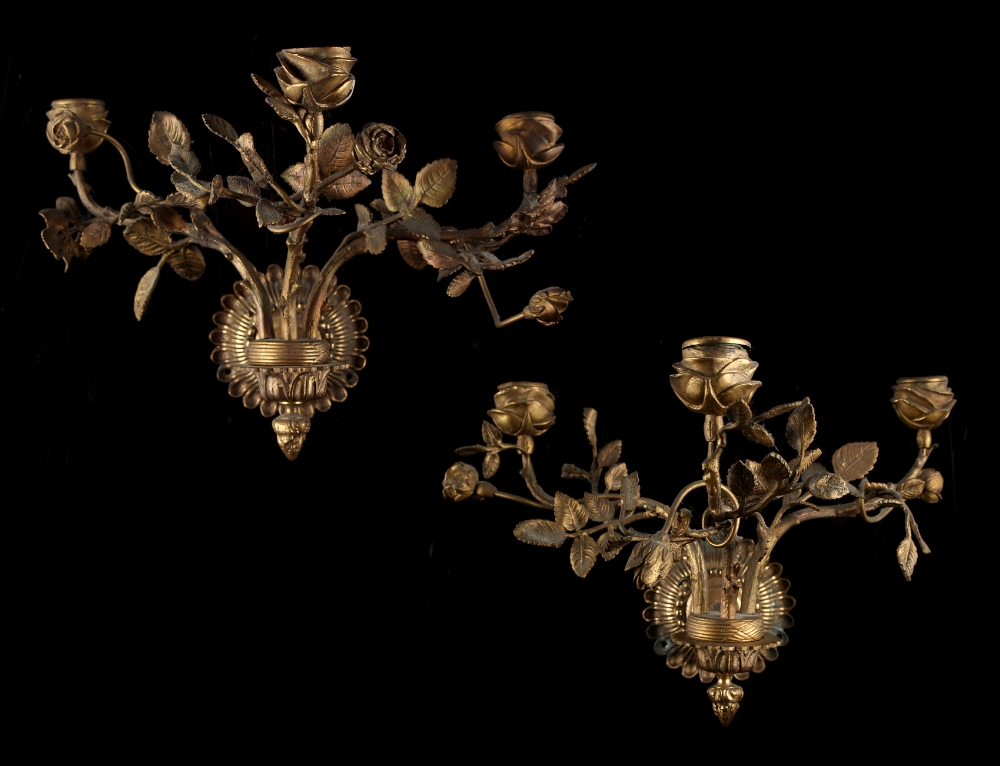 Property of a lady - a pair of gilt metal three branch wall light candle sconces, modelled as