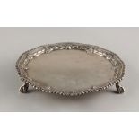 Property of a deceased estate - an early George III silver salver, on ball & claw feet, Richard