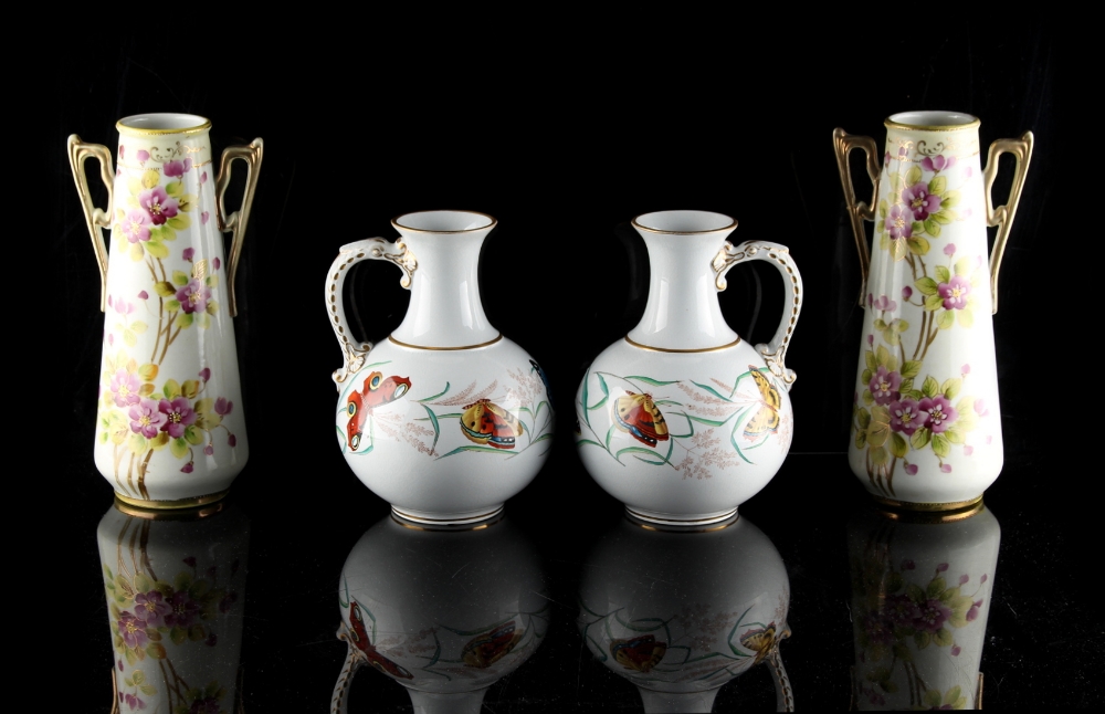 Property of a lady - a pair of Victorian pottery vases painted with butterflies, each 7.9ins. (