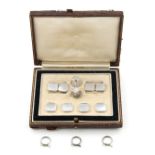 Property of a lady - a cased set of 9ct white gold & mother-of-pearl cufflinks, buttons & studs (one