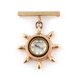 Property of a lady - a 10ct yellow gold capstan framed compass pendant, suspended from a 9ct gold