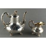 Property of a deceased estate - a 19th century French silver teapot and matching milk jug, makers