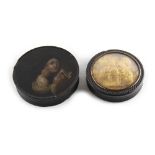 Property of a lady - a 19th century French tortoiseshell circular snuff box, the cover with inset