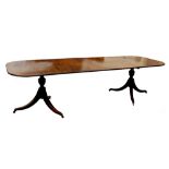 Property of a gentleman - a mahogany D-end twin pillar extending dining table, with two extra