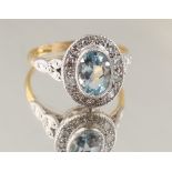 An 18ct yellow gold aquamarine & diamond ring, the oval cut aquamarine weighing approximately 1.48