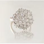 Property of a lady - an 18ct white gold diamond cluster ring, the estimated total diamond weight 2.