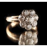 Property of a lady - an 18ct yellow gold diamond cluster ring, the central Old European cut