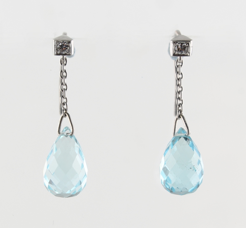 A pair of aquamarine & diamond pendant drop earrings, for pierced ears, each with a single pear