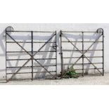 Property of a lady - a pair of wrought iron driveway gates, 108ins. (274.5cms.) span, including