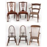 Property of a deceased estate - an elm seated spindle back elbow chair; together with five other