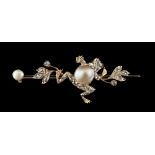 A late Victorian yellow gold diamond & pearl brooch modelled as a frog or toad flanked by leaves,