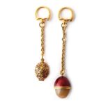 Property of a lady - a Thai high carat yellow gold (tests 21ct) enamel & hardstone egg shaped fob