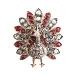 A yellow gold ruby & diamond peacock brooch, circa 1890, with round cut rubies & rose cut