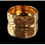 Property of a deceased estate - an 18ct gold wedding band with chased foliate decorations,