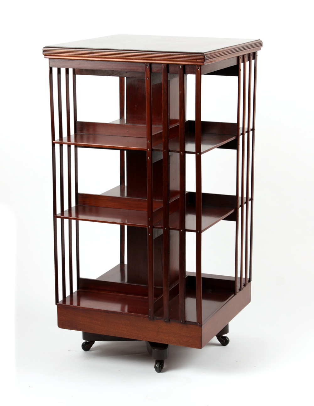 Property of a deceased estate - an Edwardian mahogany three-tier revolving bookcase (see