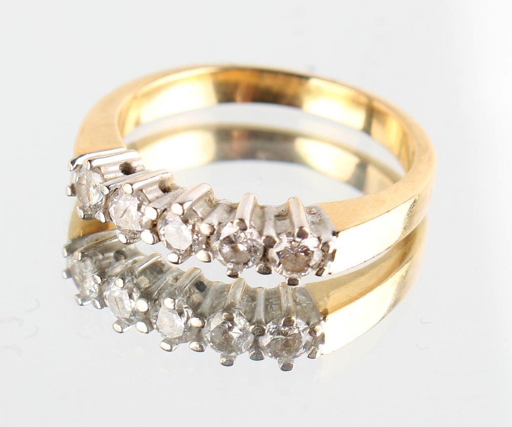 Property of a lady - an unmarked yellow gold five stone diamond ring, the estimated total diamond