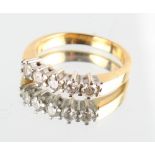 Property of a lady - an unmarked yellow gold five stone diamond ring, the estimated total diamond