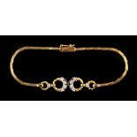 Property of a lady - an 18ct yellow gold & diamond set link bracelet, the total diamond weight
