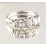 Property of a deceased estate - an 18ct white gold diamond five stone ring, the graduated Old