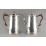 Property of a lady - a silver coffee pot and matching hot water jug, each of tapering oval form with