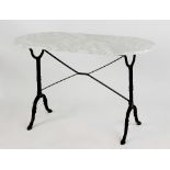 Property of a deceased estate - a cast iron garden table with white marble top, 46.75ins. (