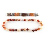 Property of a lady - an agate bead necklace, the thirty individually knotted beads varying in size