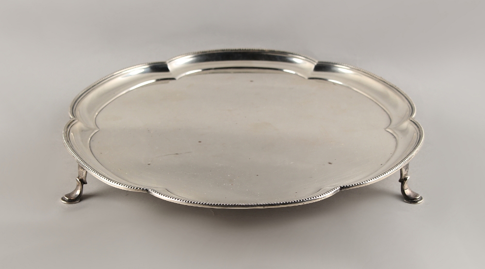 Property of a lady - a silver salver or waiter, with beaded rim & hoof feet, Mappin & Webb,