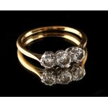 Property of a deceased estate - n 18ct yellow gold diamond three stone ring, the brilliant cut
