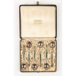Property of a lady - an ealy 20th century cased set of six Maori white metal & nephrite jade