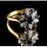 Property of a lady - an 18ct yellow gold sapphire & diamond flowerhead cluster ring, set with a