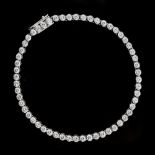 An 18ct white gold diamond link bracelet, set with fifty-six round brilliant cut diamonds, the