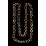 Property of a lady - a heavy 9ct gold fancy link chain necklace, 24ins. (61cms.)long,