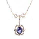 A Belle Epoque style amethyst & diamond pendant necklace, the oval cut amethyst weighing