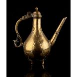 Property of a gentleman - an Islamic bronze ewer, 18th / 19th century, with engraved floral