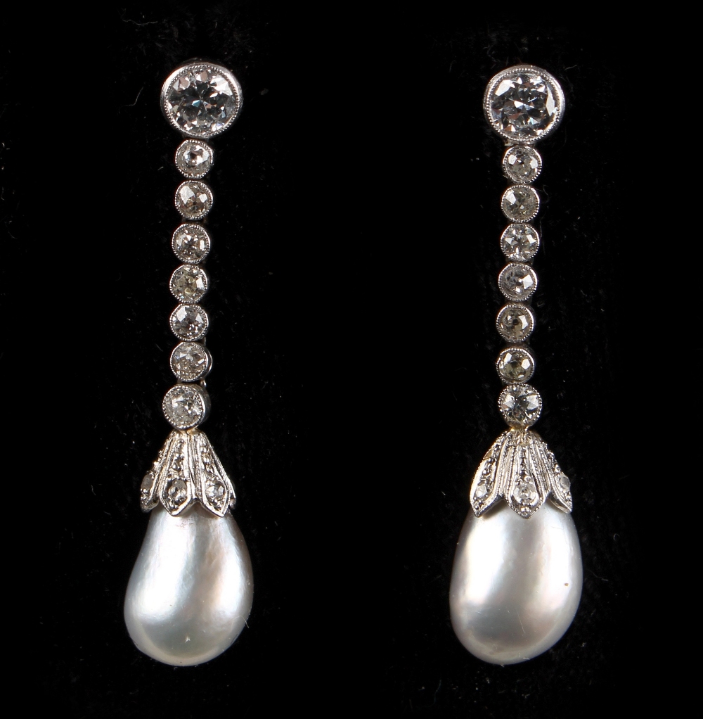 A large pair of certificated natural saltwater pearl & diamond drop earrings, the two pearls of