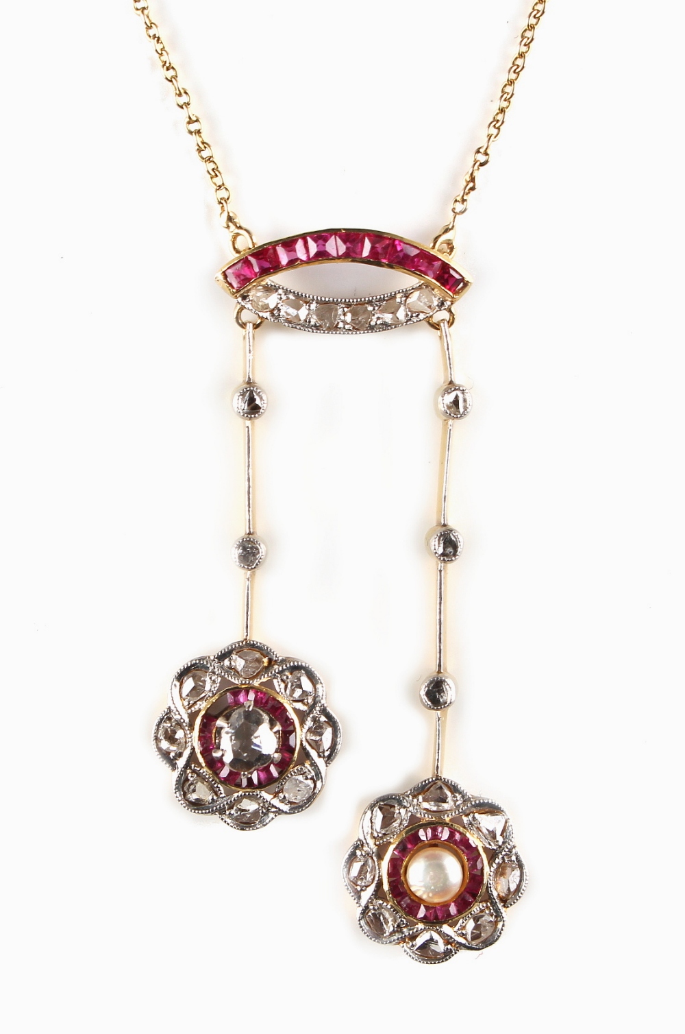 An attractive yellow gold ruby diamond & pearl tassel necklace, 17.75ins. (45cms.) long (see