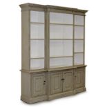 Property of a gentleman - a pale green painted breakfront two-part bookcase, 78ins. (198cms.)