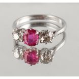 A platinum ruby & diamond three stone ring, the certificated untreated Burmese cushion cut ruby