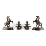 Property of a gentleman - a pair of Japanese bronze candlesticks, 4.95ins. (12.5cms.) high; together