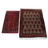 Property of a lady - a Persian hand knotted wool rug, 76 by 59ins. (193 by 151cms.); together with a