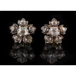 A pair of diamond flowerhead cluster earrings, with post & butterfly fastenings, each set with six