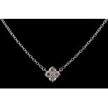 A Cartier 18ct white gold & diamond stylised flowerhead pendant on chain necklace, set with five