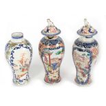 Property of a lady - three 18th century Chinese famille rose baluster vases, extensively damaged,