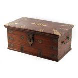 An Indian hardwood box with pierced brass mounts, 17ins. (43cms.) wide (see illustration).