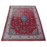 Property of a gentleman - a Mahal carpet, with red ground, 156 by 120ins. (397 by 303cms.) (see