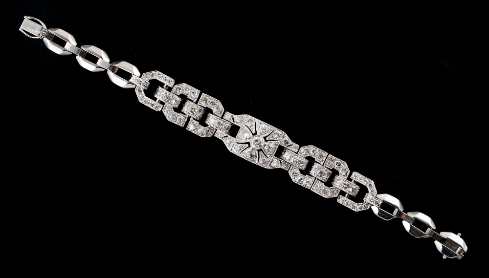 A Swedish 18ct white gold diamond link bracelet, the estimated total diamond weight 5.11 carats, 6.